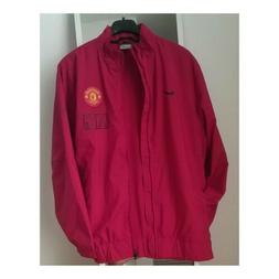 Giacca NIKE- MANCHESTER UNITED. Taglia XL per ragazzi. Rossa